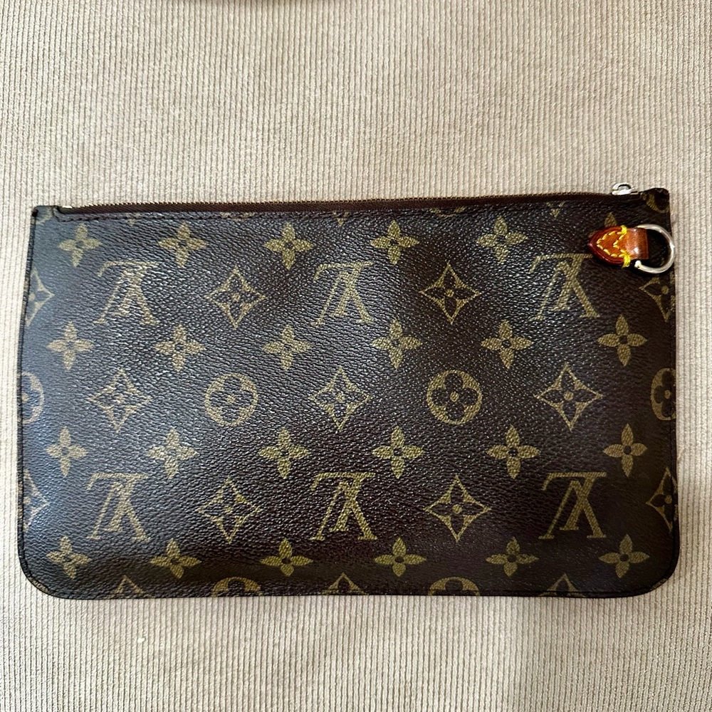 Authentic Louis Vuitton Neverfull clutch bag.